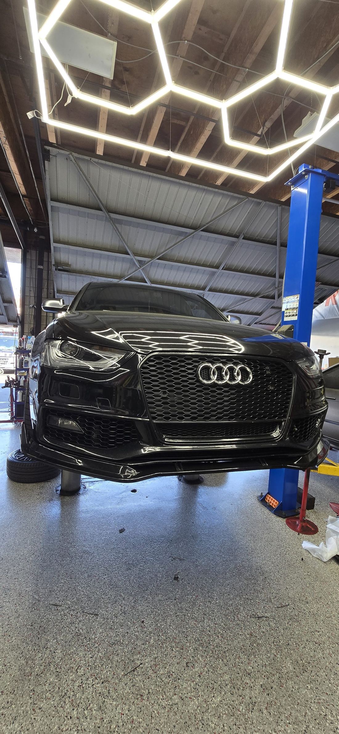 Audi RS on the lift for service at DA Auto Repair